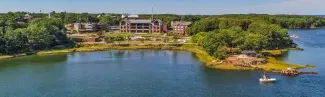 An aerial image of the coastline on U N E's Biddeford campus